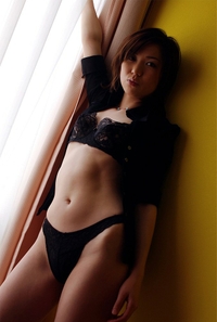 Sexy Japanese poses in her black lingerie