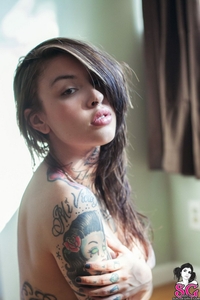 Tattooed teen Carrina stripping at home