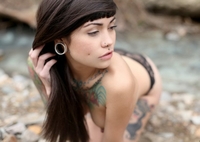 Tattooed young amazon Violet Rose
