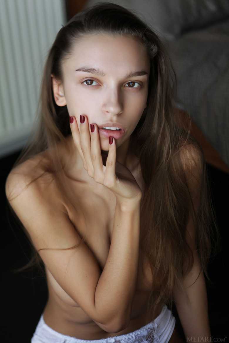 Pretty Elin Plucks A Fresh Flower