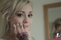 Tattoed blonde teen Rose stripping
